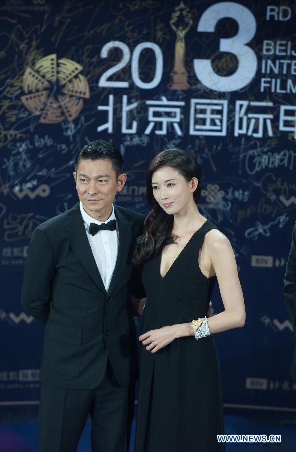 Actor Andy Lau (L) and actress Chiling attend the closing ceremony of the 2013 Beijing International Film Festival in Beijing, capital of China, April 23, 2013. The festival closed on Tuesday. (Xinhua/Zhang Yu) 