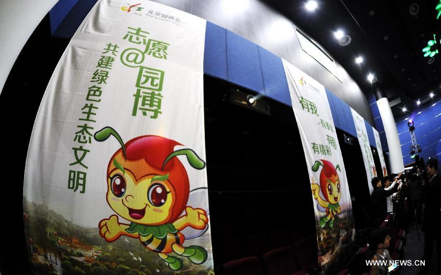 Posters of the "Little V Bee", mascot designed for the volunteers of the ninth China (Beijing) International Garden Expo, are seen at a press conference in Beijing, capital of China, April 23, 2013. The mascot for volunteers is given a nickname of "Little V Bee" as V stands for victory and bee is a symbol of diligence in Chinese culture. A total of 51,096 people have so far registered for the volunteer service during the expo. (Xinhua/Li Xin)