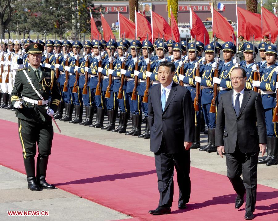 Chinese President Xi Jinping (2nd R, front) holds a welcoming ceremony for French President Francois Hollande (front R) in Beijing, capital of China, April 25, 2013. (Xinhua/Zhang Duo)