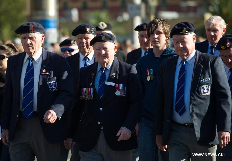 War veterans attend the service marking the Anzac Day at the Shrine of Remembrance in Melbourne, Australia, April 25, 2013. Anzac Day is a national day of remembrance in Australia and New Zealand, originally to honor the members of the Australian and New Zealand Army Corps (ANZAC) who fought at Gallipoli during World War I and now more to commemorate all those who served and died in military operations for their countries. (Xinhua/Bai Xue)