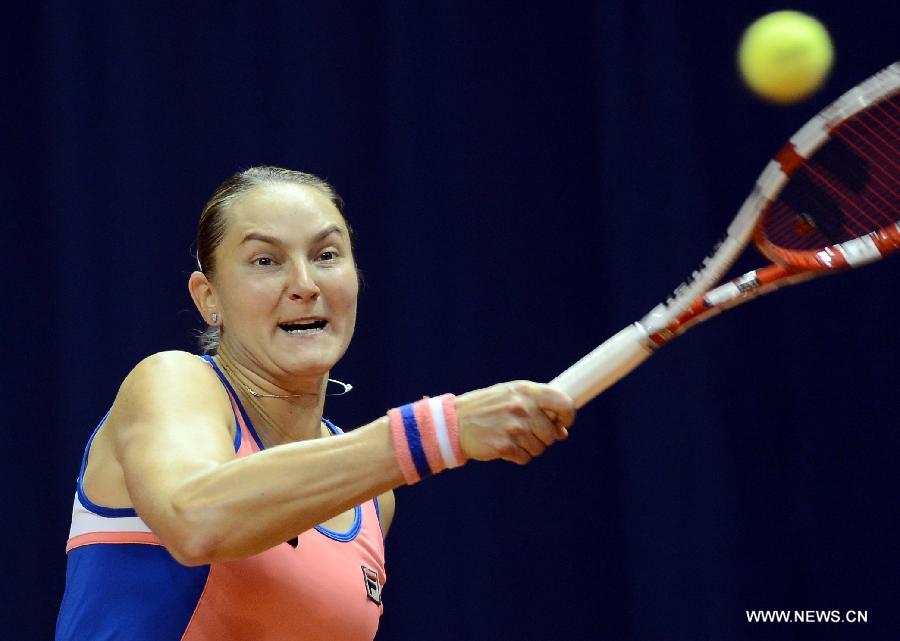 Nadia Petrova of Russia returns the ball during the second round match of Porsche Tennis Grand Prix against Ana Ivanovic of Serbia in Stuttgart, Germany, on April 25, 2013. Petrova lost 0-2. (Xinhua/Ma Ning)