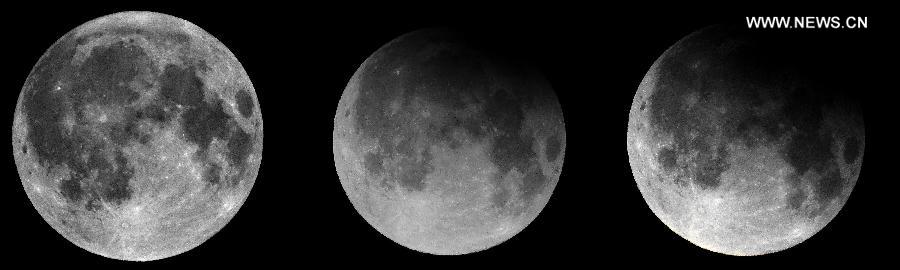 Combination photo taken on April 26, 2013 shows a partial lunar eclipse over the sky of Beijing, capital of China. The earth casts a shadow on the face of the moon and makes the partial lunar eclipse. (Xinhua/Li Xin) 