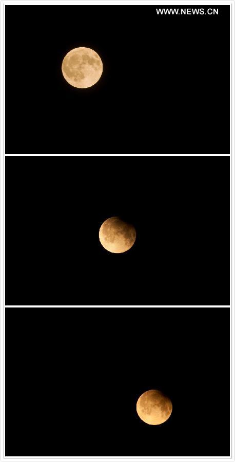 Combination photo taken on April 26, 2013 shows a partial lunar eclipse over the sky of Beijing, capital of China. The earth casts a shadow on the face of the moon and makes the partial lunar eclipse. (Xinhua/Zhang Cheng) 