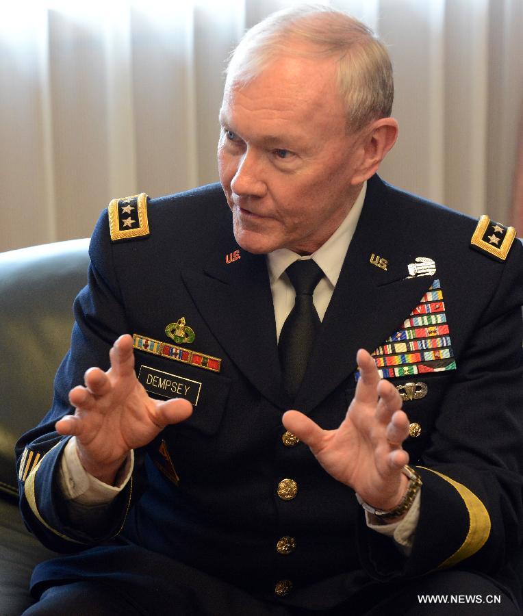 U.S. Chairman of the Joint Chiefs of Staff Army Gen. Martin Dempsey meets with Japan's Defense Minister Itsunori Onodera (not in the photo) at the Defense Ministry in Tokyo April 26, 2013.(Xinhua/Ma Ping) 