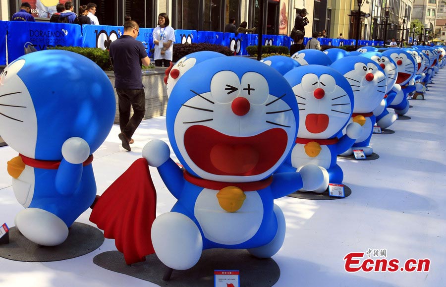 An exhibition featuring 100 Doraemons with 100 different gadgets and machines it used in the series is held at Xintiandi in Shanghai, April 26, 2013. It is the largest exhibition featuring Doraemon on the Chinese mainland. (CNS/Pan Suofei)