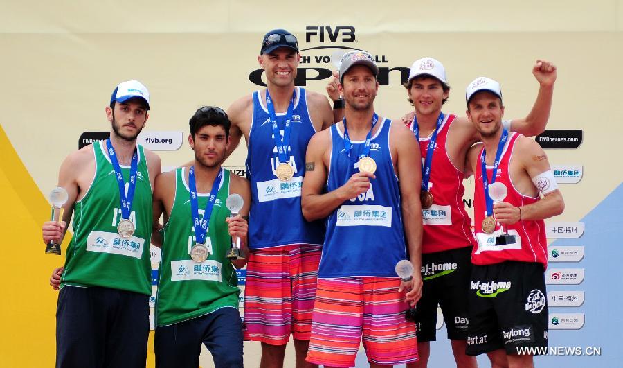 Sean Rosenthal(3rd, R) and Philip Dalhausser (3rd, L) of the United States, Nicolai Paolo (1st, L) and Daniele Lupo (2nd, L) of Italy, Alexander Huber (2nd, R)and Robin Seidl of Austria celebrate during the awarding ceremony for the men's event of the Fuzhou Open, the beginning of the 2013 beach volleyball season, in Fuzhou, southeast China's Fujian province, April 27, 2013. Sean Rosenthal and Philip Dalhausser from the United States won the final 2-0 to claim the title of the event. Nicolai Paolo/Daniele Lupo of Italy won the second place. Alexander Huber and Robin Seidl of Austria took the third place. (Xinhua/Lin Shanchuan)