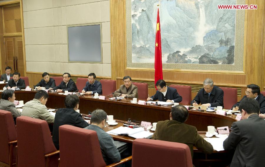 Chinese Vice Premier Wang Yang (4th R, rear) addresses a meeting concerning a national crackdown on intellectual property rights infringements and the production and distribution of counterfeit goods, in Beijing, capital of China, April 28, 2013. (Xinhua/Huang Jingwen)