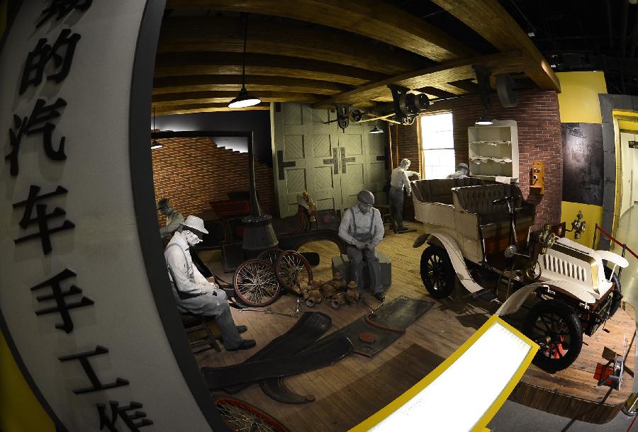 Photo taken on April 28, 2013 shows a workshop model of early automobile manufacturing in the Beijing Auto Museum in Beijing, capital of China. Beijing Auto Museum, a museum aimed at the promotion of auto culture, was awarded the National 4A tourist attraction on Sunday. (Xinhua/Qi Heng)