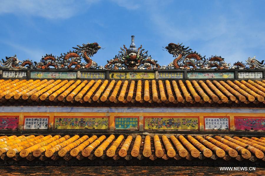 Photo taken on April 28, 2013 shows the roof of a building in Hue, a famous historic and cultural city in central Vietnam. Hue was the capital of Nguyen Dynasty, the country's last feudal dynasty. Hue was recognized by the United Nations Educational, Scientific and Cultural Organization as a World Heritage in 1993. (Xinhua/Zhang Jianhua)