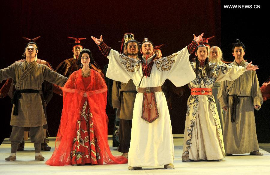 Actors from Beijing People's Art Theater take curtain call after playing drama "Our Assassin Jing Ke," which is written by Nobel Prize laureate Mo Yan, in Jinan, capital of east China's Shandong Province, April 28, 2013. Jing Ke (?-227B.C.) was renowned for his failed assassination attempt of Ying Zheng (259B.C.-210B.C.), King of Qin State, who later became China's first emperor in 221 B.C.. (Xinhua/Xu Suhui)