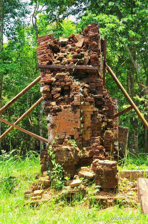 Reinforced structures in My Son Sanctuary, which was badly wrecked during last century's Vietnam War, are seen in central Vietnam, on April 29, 2013. Between the 4th and 13th centuries, a unique culture which owed its spiritual origins to Indian Hinduism developed on the coast of contemporary Vietnam. It was graphically illustrated by the remains of a series of impressive tower-temples located in My Son that was the religious and political capital of the Champa Kingdom for most of its existence. My Son Sanctuary was inscripted in UNESCO's World Cultural Heritage list in 1999. (Xinhua/Zhang Jianhua) 