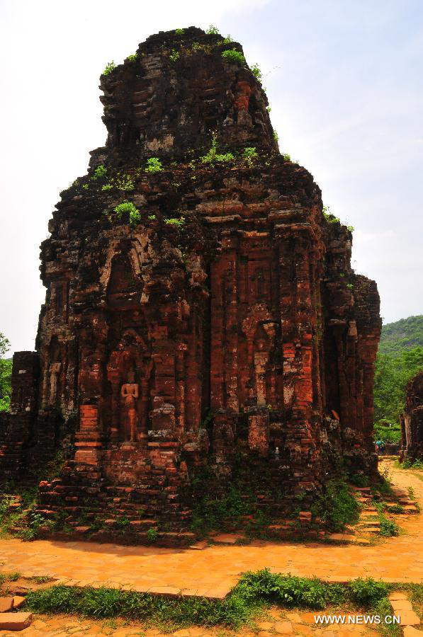 Relics of My Son Sanctuary is seen in central Vietnam, on April 29, 2013. Between the 4th and 13th centuries, a unique culture which owed its spiritual origins to Indian Hinduism developed on the coast of contemporary Vietnam. It was graphically illustrated by the remains of a series of impressive tower-temples located in My Son that was the religious and political capital of the Champa Kingdom for most of its existence. My Son Sanctuary was inscripted in UNESCO's World Cultural Heritage list in 1999. (Xinhua/Zhang Jianhua)