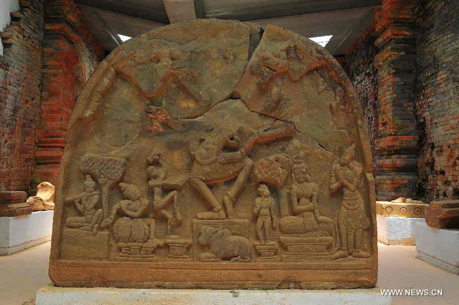 A piece of stonework exhibited in the relics of My Son Sanctuary is seen in central Vietnam, on April 29, 2013. Between the 4th and 13th centuries, a unique culture which owed its spiritual origins to Indian Hinduism developed on the coast of contemporary Vietnam. It was graphically illustrated by the remains of a series of impressive tower-temples located in My Son that was the religious and political capital of the Champa Kingdom for most of its existence. My Son Sanctuary was inscripted in UNESCO's World Cultural Heritage list in 1999. (Xinhua/Zhang Jianhua) 