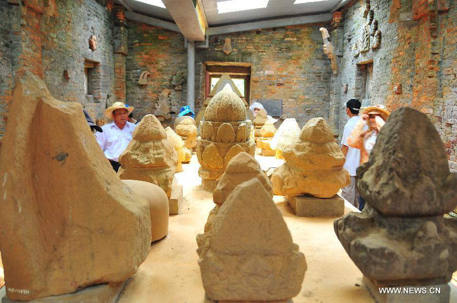 Stoneworks exhibited in the relics of My Son Sanctuary are seen in central Vietnam, on April 29, 2013. Between the 4th and 13th centuries, a unique culture which owed its spiritual origins to Indian Hinduism developed on the coast of contemporary Vietnam. It was graphically illustrated by the remains of a series of impressive tower-temples located in My Son that was the religious and political capital of the Champa Kingdom for most of its existence. My Son Sanctuary was inscripted in UNESCO's World Cultural Heritage list in 1999. (Xinhua/Zhang Jianhua) 