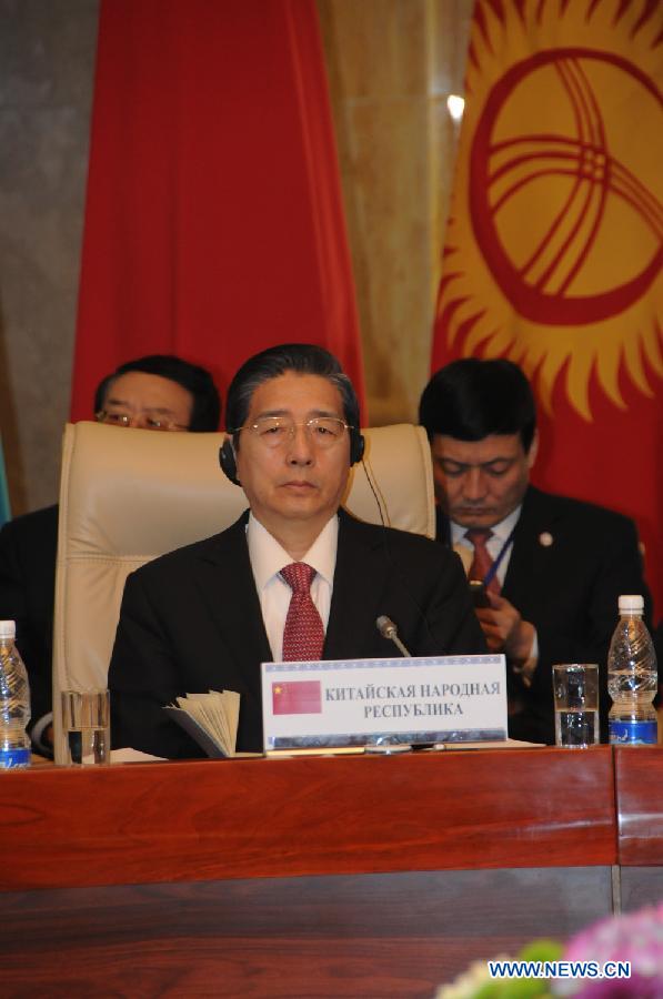 Chinese State Councilor Guo Shengkun attends the secretarial meeting of SCO members' security councils in Bishkek, capital of Kyrgyzstan, on April 29, 2013. The new Chinese leadership will give full support to law enforcement and security cooperation within the framework of the Shanghai Cooperation Organization (SCO), Guo Shengkun said here Monday. (Xinhua/Guan Jianwu)