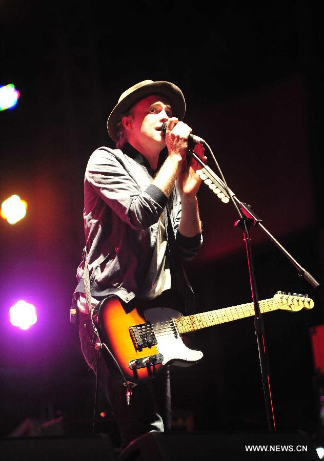 Francis Healy of the Scottish rock band Travis sings during the 5th Strawberry Music Festival at the Tongzhou Canal Park in Beijing, capital of China, April 29, 2013. The three-day festival kicked off here on April 29, involving some 160 performing teams from at home and abroad. (Xinhua/Xiao Xiao) 