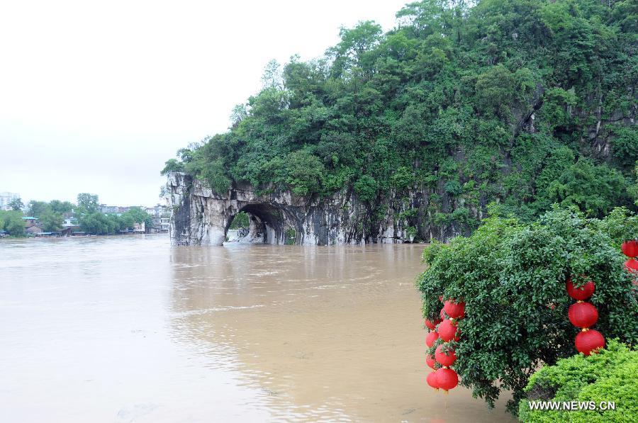 Photo taken on April 30, 2013 shows the Elephant Trunk Hill submerged in flood in Guilin of southwest China's Guangxi Zhuang Autonomous Region. Heavy rainfall hit many places in Guangxi on April 29 and 30. (Xinhua/Zhao Jiazhi)