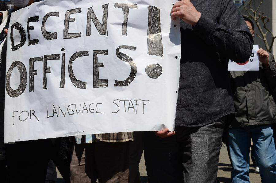 UN staff members take part in a protest demanding more decent working conditions, at the UN headquarters in New York, on May 1, 2013. (Xinhua/Niu Xiaolei) 