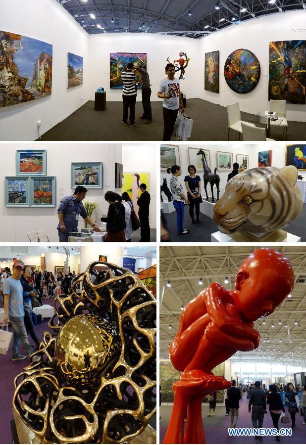 Combination photo taken on May 1, 2013 shows visitors view artworks at the Art Beijing 2013 in Beijing, capital of China, May 1, 2013. Opened Wednesday at Agricultural Exhibition Center in Beijing, the annual art fair attracted some 150 participating art organizations. (Xinhua/Li Xin)