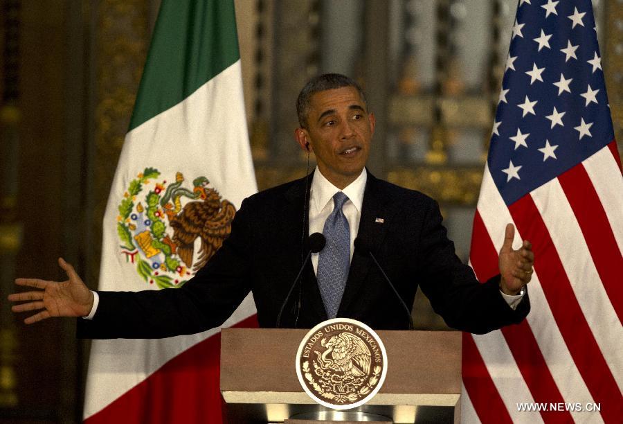 U.S. President Barack Obama speaks during a joint press conference with Mexican President Enrique Pena Nieto after a bilateral meeting at the National Palace in Mexico City, capital of Mexico, on May 2, 2013. Obama visits Mexico to meet with Pena Nieto and analyze matters concerning education, infrastructure, commerce, migration and security, according to the local press. (Xinhua/David de la Paz) 