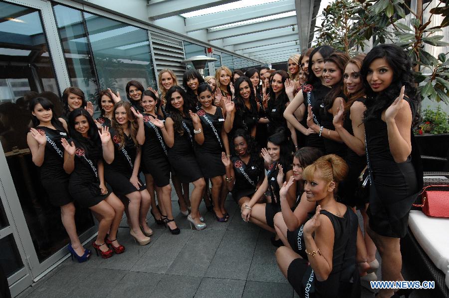 Miss World Canada 2013 contestants pose for photos during a media event in Vancouver, Canada, on May 2, 2013. Miss World Canada 2013 will be held on May 9 in Richmond, British Columbia, and the winner will represent Canada at Miss World 2013 event in Jakarta, capital of Indonesia, in September. (Xinhua/Sergei Bachlakov)
