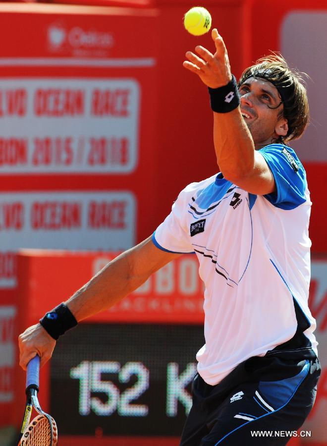Spain's David Ferrer serves during the men's singles quarterfinal against Romania's Victor Hanescu during the 2013 Portugal Open in Lisbon, Portugal, May 3, 2013. Ferrer won the match 2-0. (Xinhua/Zhang Liyun) 