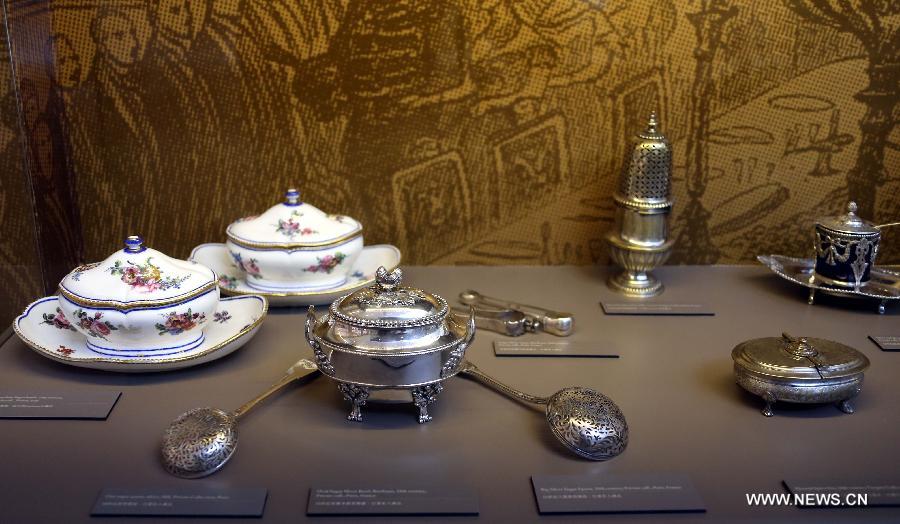 Photo taken on May 4, 2013 shows a set of classic tableware displayed in an exhibition of "Splendour of the French Table" in Hong Kong, south China. As one of the activities of "French May", the exhibition which will last till June 9 presents tableware from leading French historical manufactures and luxury maisons since the 18th century. (Xinhua/Li Peng) 