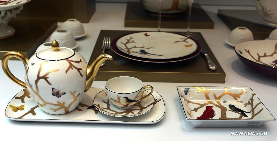 Photo taken on May 4, 2013 shows a set of classic tableware displayed in an exhibition of "Splendour of the French Table" in Hong Kong, south China. As one of the activities of "French May", the exhibition which will last till June 9 presents tableware from leading French historical manufactures and luxury maisons since the 18th century. (Xinhua/Li Peng) 