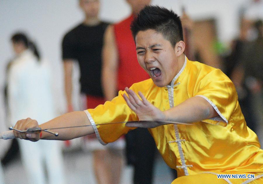 Gary Chen of Canada competes during the 34th annual Can-Am International Martial Arts Championships in Richmond, BC, Canada, May 4, 2013. The annual Can-Am has several categories for competition, including Chinese traditional Kungfu, Wushu, Tai Chi, Karate and Taekwondo. (Xinhua/Sergei Bachlakov) 