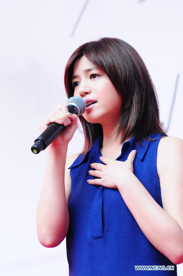 Actress Michelle Chen performs during a signing promotion event for her new album "Me, Myself and I" in Taipei, southeast China's Taiwan, May 5, 2013. (Xinhua)