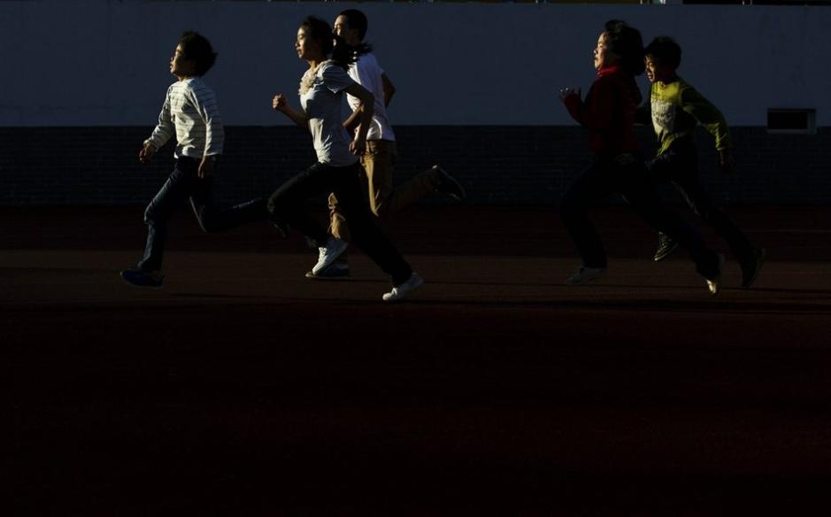 Players in physical training, April 18, 2013. (Xinhua/Fei Maohua)