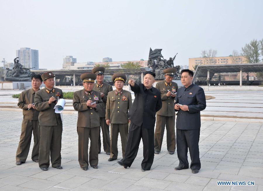 The photo provided by KCNA on May 7, 2013 shows top leader of the Democratic People's Republic of Korea (DPRK) Kim Jong Un (3rd R) inspecting construction projects built by Korean People's Army on May 6, 2013. (Xinhua/KCNA)