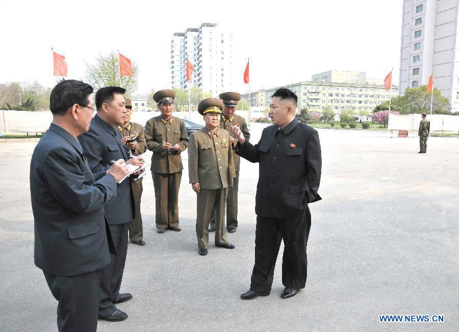 The photo provided by KCNA on May 7, 2013 shows top leader of the Democratic People's Republic of Korea (DPRK) Kim Jong Un (1st R) inspecting construction projects built by Korean People's Army on May 6, 2013. (Xinhua/KCNA)