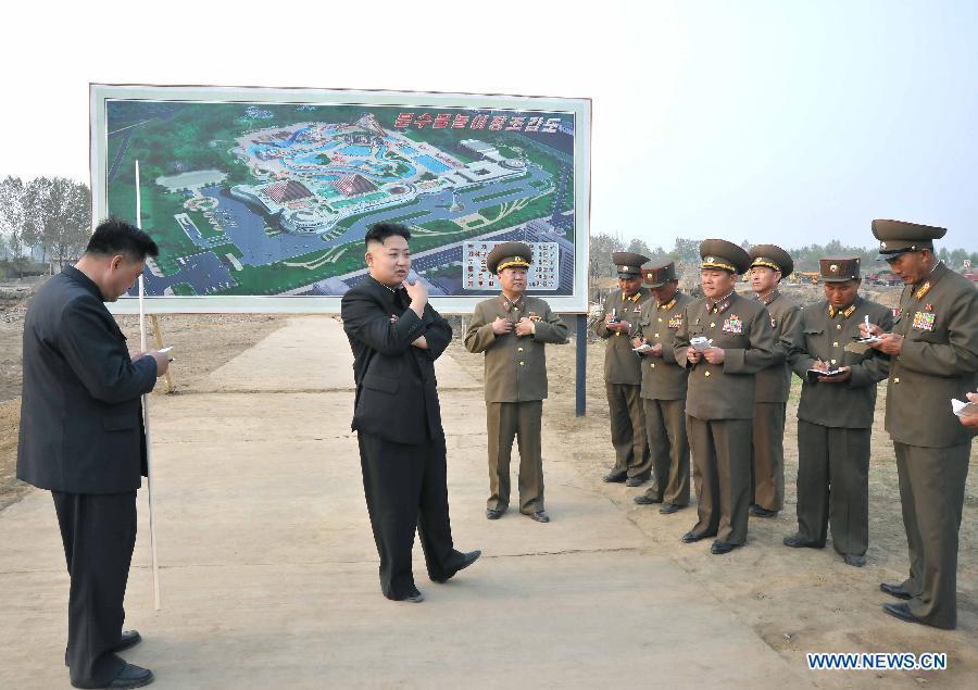 The photo provided by KCNA on May 7, 2013 shows top leader of the Democratic People's Republic of Korea (DPRK) Kim Jong Un (2nd L) inspecting construction projects built by the Korean People's Army on May 6, 2013. (Xinhua/KCNA)