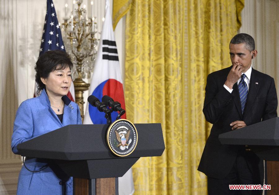 U.S. President Barack Obama (R) and visiting South Korean President Park Geun-hye attend a joint press conferece after their meetings in the East Room of the White House in Washington D.C., capital of the United States, May 7, 2013. (Xinhua/Zhang Jun) 