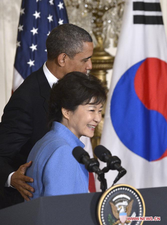 U.S. President Barack Obama and visiting South Korean President Park Geun-hye attend a joint press conferece after their meetings in the East Room of the White House in Washington D.C., capital of the United States, May 7, 2013. (Xinhua/Zhang Jun) 