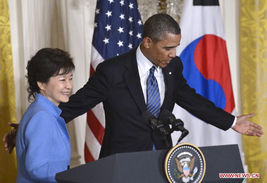 U.S. President Barack Obama (R) and visiting South Korean President Park Geun-hye attend a joint press conferece after their meetings in the East Room of the White House in Washington D.C., capital of the United States, May 7, 2013. (Xinhua/Zhang Jun) 