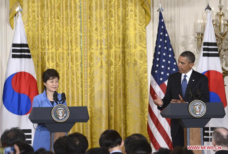 U.S. President Barack Obama (R) and visiting South Korean President Park Geun-hye attend a joint press conferece after their meetings in the East Room of the White House in Washington D.C., capital of the United States, May 7, 2013. (Xinhua/Zhang Jun) 