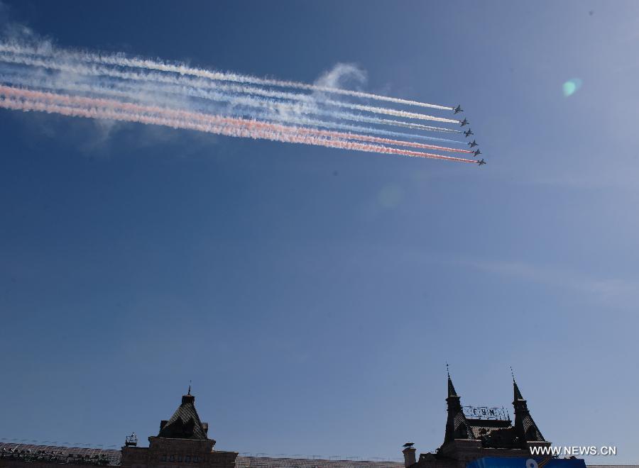 Su-25 strike aircrafts take part in a Victory Day parade at the Red Square in Moscow, Russia, on May 9, 2013. A grand parade was held on Thursday at the Red Square to mark the 68th anniversary of the Soviet Union's victory over Nazi Germany in the Great Patriotic War. (Xinhua/Jiang Kehong)