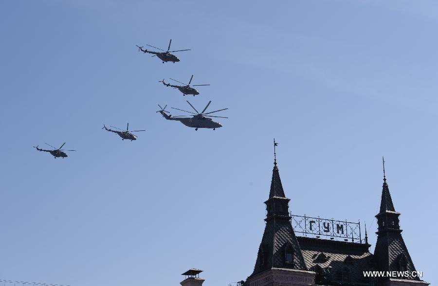 Ka-25 helicopters take part in a Victory Day parade at the Red Square in Moscow, Russia, May 9, 2013. A grand parade was held on Thursday at the Red Square to mark the 68th anniversary of the Soviet Union's victory over Nazi Germany in the Great Patriotic War. (Xinhua/Jiang Kehong)