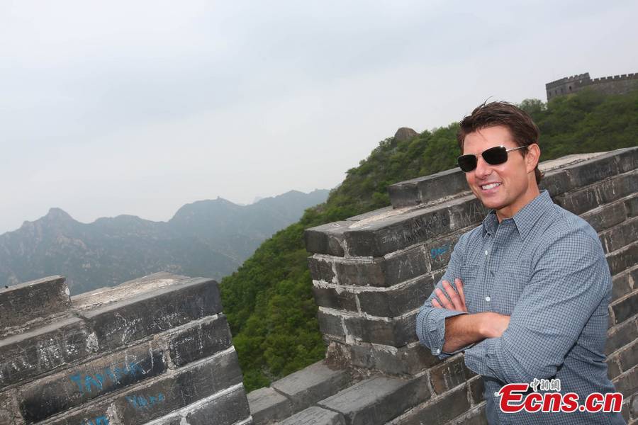 Tom Cruise stands on the Great Wall in Beijing, May 9, 2013. Cruise arrived in China to promote his new movie "Oblivion" that would be released on May 10. (CNS/Li Xueshi)