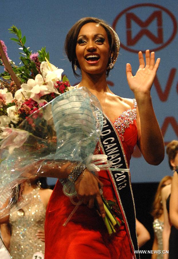Camille Munro of Regina, Saskatchewan, poses after being crowned as Miss World Canada 2013 on May 9, 2013 in Richmond, BC, Canada. She will represent Canada at Miss World 2013 in Jakarta, Indonesia, in September. (Xinhua/Sergei Bachlakov)