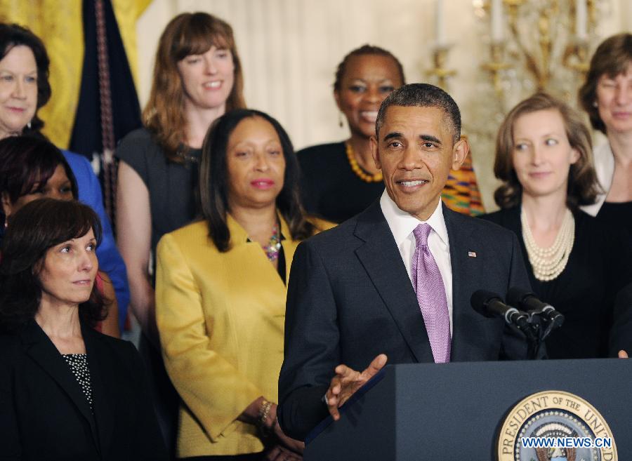 U.S. President Obama speaks on the impact of the Affordable Care Act on the health, lives and pocketbooks of women and their families at the White House in Washington D.C. May 10, 2013. (Xinhua/Fang Zhe) 