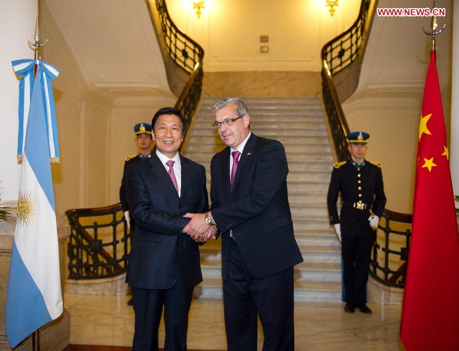 Argentine President of the Chamber of Deputies Julian Dominguez (R) meets with visiting Chinese Vice President Li Yuanchao in Buenos Aires, Argentina, May 10, 2013.(Xinhua/Weng Xinyang)