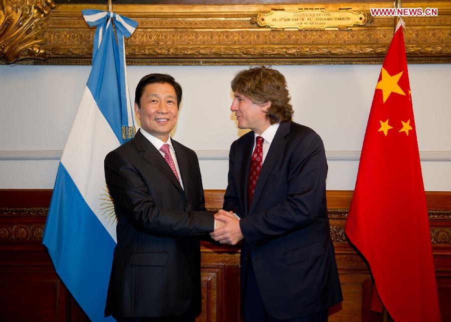Argentine Vice President and President of the Senate Amado Boudou (R) meets with visiting Chinese Vice President Li Yuanchao in Buenos Aires, Argentina, May 10, 2013.(Xinhua/Weng Xinyang)