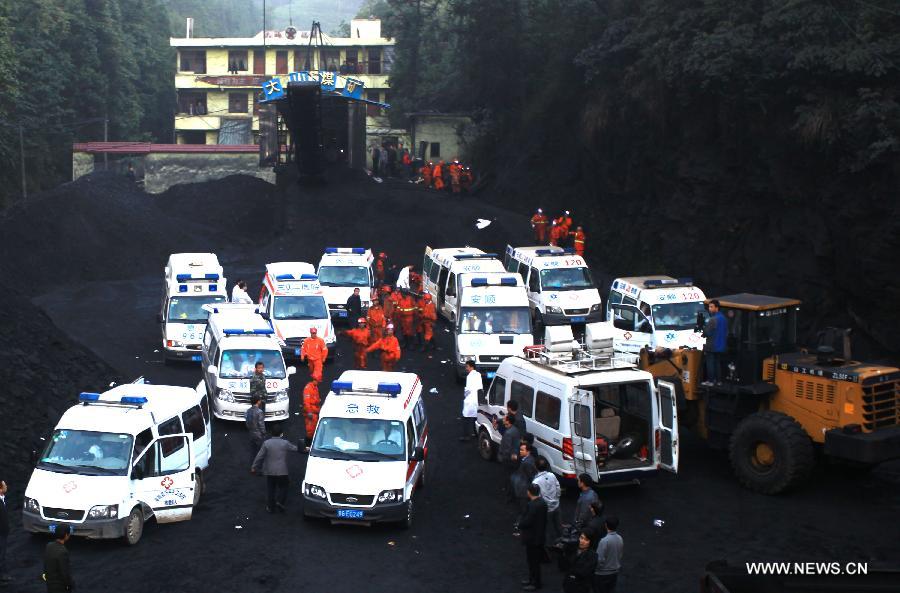 Ambulances park at the Dashan coal mine where a colliery gas explosion occurred in Pingba County, southwest China's Guizhou Province, May 11, 2013. Twelve people were killed and two others injured in the explosion on the evening of May 10. (Xinhua) 