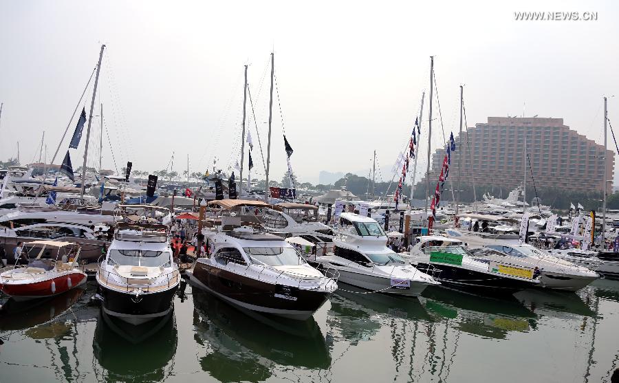 Photo taken on May 11, 2013 shows yachts at an exhibition held by the Gold Coast Yacht Country Club in Hong Kong, south China. The exhibition has attracted 70 exhibitors around the world bringing their luxurious yachts as well as a fancy lifestyle at sea. (Xinhua/Li Peng) 