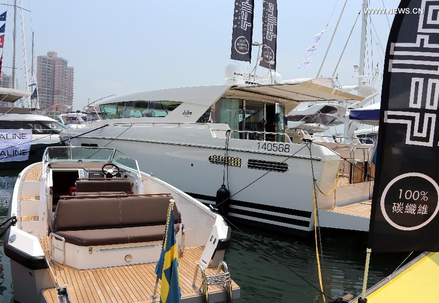 Photo taken on May 11, 2013 shows yachts at an exhibition held by the Gold Coast Yacht Country Club in Hong Kong, south China. The exhibition has attracted 70 exhibitors around the world with their luxurious yachts as well as a fancy lifestyle at sea. (Xinhua/Li Peng) 