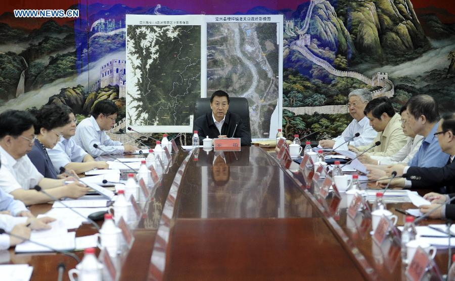 Chinese state councilor Wang Yong, also head of China's National Committee for Disaster Reduction, presides over a meeting of the committee in Beijing, capital of China, May 12, 2013. Wang Yong called for an improvement of disaster relief and prevention capabilities to protect people's lives and properties in the country on Sunday. (Xinhua/Zhang Duo)