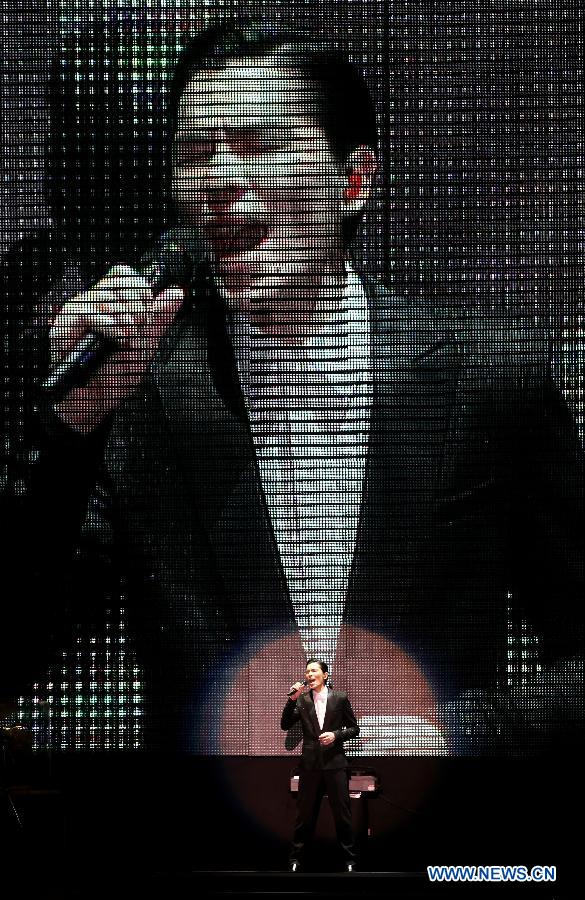 Singer Jam Hsiao performs during a memorial concert for Teresa Teng (1953-1995), one of the most famous pop singers in China, in the Taipei Arena in Taipei, southeast China's Taiwan, May 12, 2013. (Xinhua/Xie Xiudong) 